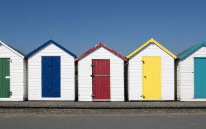 Beach huts blue sky